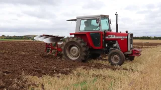 Massey 575 Ploughing