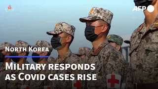 North Korea military ramps up Covid response as outbreak grows | AFP