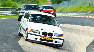 BMW E36 325i - Chasing a fast 328i through traffic on the Nurburgring Nordschleife