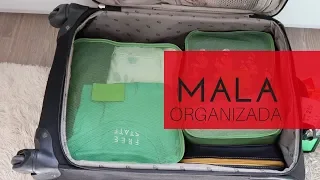 Como usar cubos organizadores para sua mala de mão