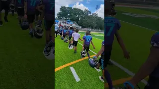 Duval Jags #7u and Tampa Jags shaking hands after game