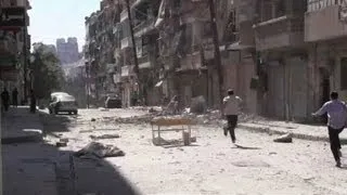 Syrian shelling rocks Aleppo neighborhood