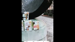 Emma Watson being a book fairy at the Suffragettes' memorial in London