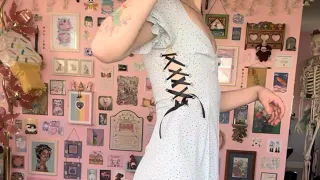 fixing a dress and adding a  ribbon corset!