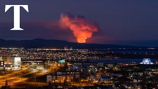 Lava flows into evacuated Icelandic town after volcano eruption