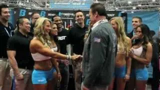 Arnold Schwarzenegger visiting the Beast Sports Nutrition booth at the Arnold Classic
