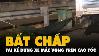 Tài xế dừng xe hàng dài, mắc võng ngủ trên cao tốc TP.HCM - Trung Lương