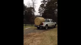 How to unload round bales from your pickup