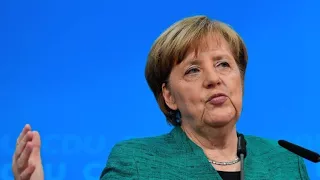 Merkel to appoint key party critic to cabinet