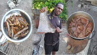 brown stew Stingray cook down in coconut milk with roasted breadfruit