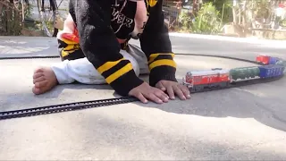 centy toy train cargo set is blocked by giant hands ( indian toy train set)