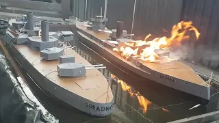 Wooden Model Ship On Fire And Sinking: Battleship Dreadnought Versus Battleship Espana