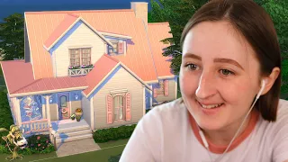 I tried building a pink cottage in The Sims 4