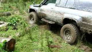 very muddy hill for a toyota surf to get up