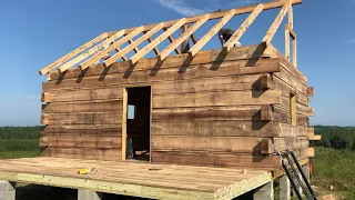 Building a Log Cabin on our Property -- Video 26 Roof Beams & Porch Flooring