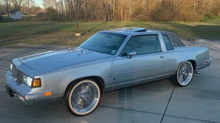 (SOLD) Forsale $25k 1985 Cutlass Supreme Brougham on 20” Daytons & Vogues 150 Spokes #Louisianawhips