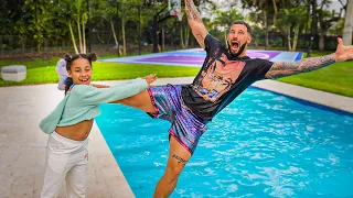 Girl PUSHES DAD in the SWIMMING POOL 😱 She INSTANTLY Regrets It!! | FamousTubeFamily