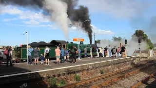 60 class departure is photobombed by Qube diesel.