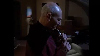 Picard playing the Flute