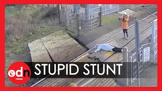 Shocking! 'Unthinkably Stupid’ Woman Poses on Train Tracks while Friend Takes Photo
