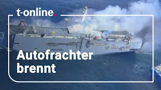 Aerial footage show a burning freighter in the North Sea