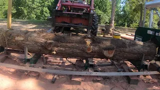 Milling a big eastern cedar log on my sawmill