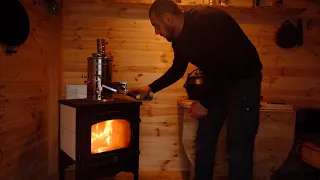 Log cabins during a thunderstorm. I build and live in a wooden hut in the forest