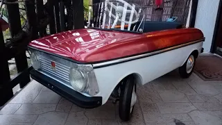 Restoration old Russian pedal car Moskvich