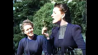 War time extravagance! Fascinating Ladies fashion clip 1943.  Color Converted and image restored.