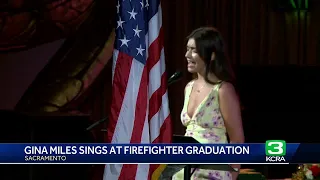 Gina Miles, winner of latest season of NBC’s The Voice, performs at Sacramento firefighter gradua...