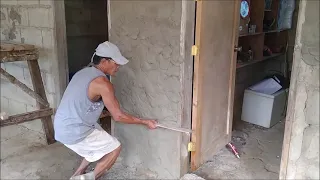 Tatay William Begins The Rendering Of His House Walls