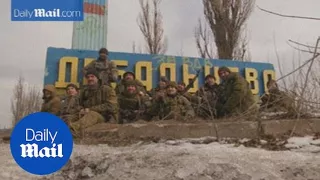 Russian-backed rebels celebrate seizing Debaltseve - Daily Mail