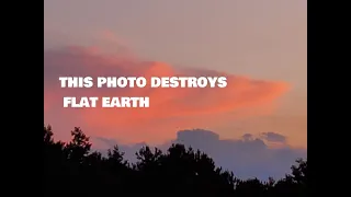 Cumulonimbus cloud at sunset destroys flat Earth!