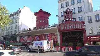 Windmill atop Paris’ famous 19th century Moulin Rouge cabaret falls from roof