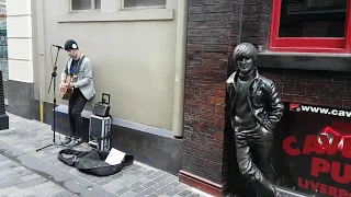 Street musician outside The Cavern Club - Strawberry Fields Forever