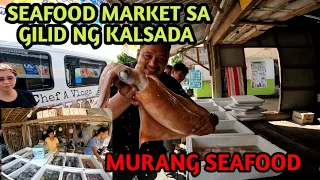 SEAFOOD MARKET SA GILID NG KALSADA SA REAL QUEZON