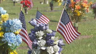 American flags planted at Evergreen Memorial Park Cemetery in honor of fallen heroes