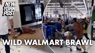 Wild Walmart brawl breaks out after shopper apparently spits on employee | New York Post