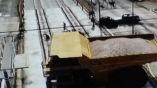 Dump truck vs train