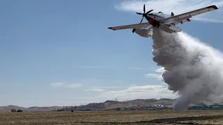 Fire Boss firefighter planes come in low with water drop in Dallesport, Wash.