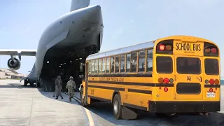 Loading Massive School Buses Inside US C-17 Globemaster III