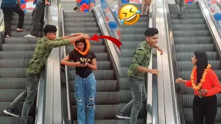 VARMALA 😜 PRANK ON CUTE GIRLS ESCALATOR | EPIC REACTION | ESCALATOR PRANK PRANKSTAR VINOD