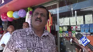 Fijian Minister for Employment Hon. Bala hands over cheques on arrears of wages to workers in Labasa