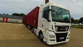 Driving at Netherlands by MAN TGX truck with container