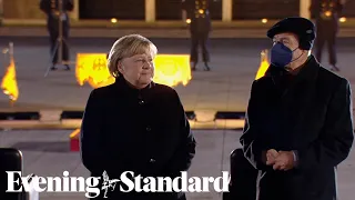 Ceremony held for Angela Merkel as she leaves office