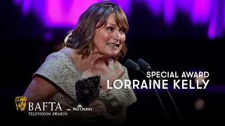 Brian Cox presents Lorraine Kelly with the BAFTA Special Award | BAFTA TV Awards