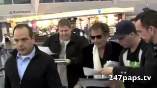 Al Pacino getting mobbed at JFK Airport in New York (Fan Cam)