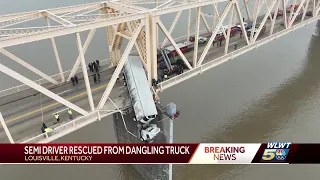 Driver rescued from semi dangling over Ohio River off Louisville bridge