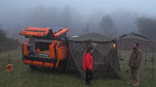 CAMPING IN A CAMPER CARAVAN IN RAINSTORM