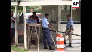 Troops move into police compounds in Fiji, seize weapons